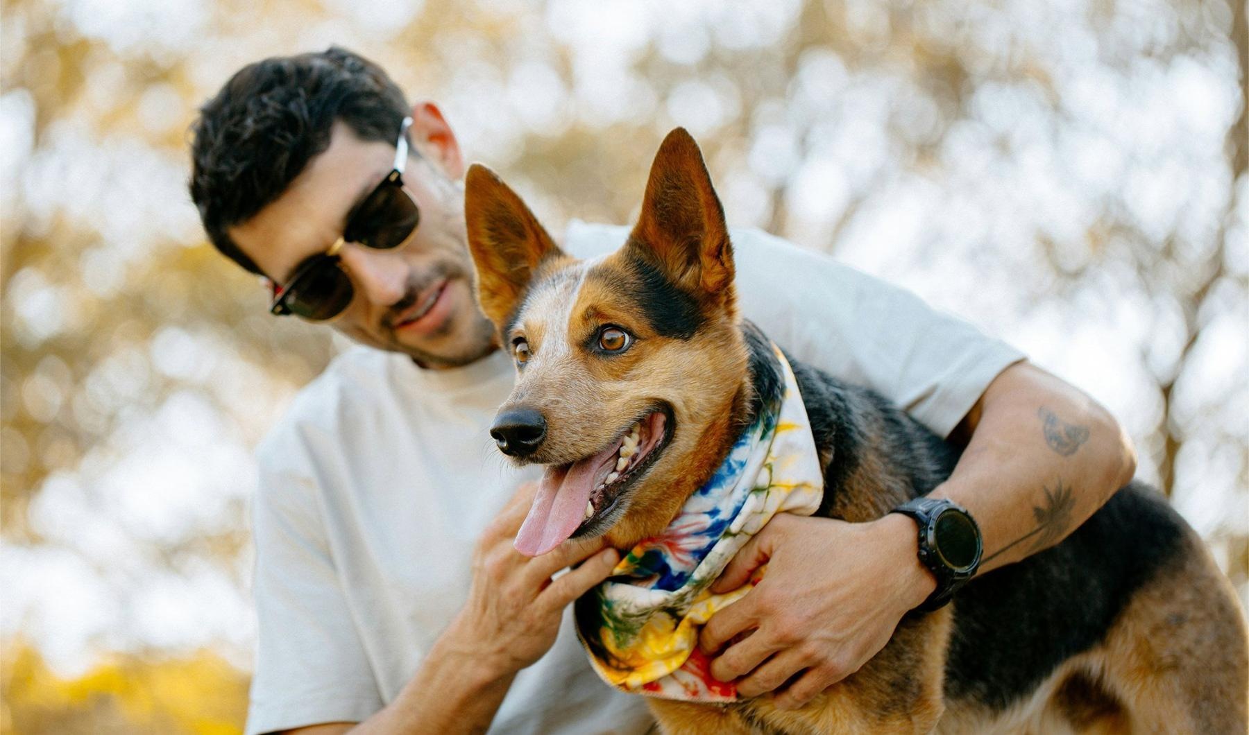 a person holding a dog