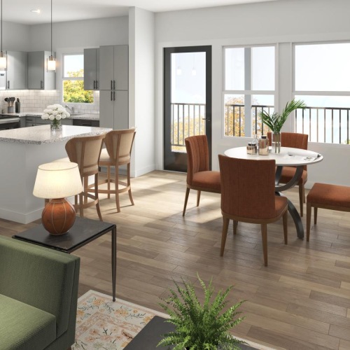 Stylish living room with table, chairs, and couch at Arbor Rose Porter apartments in montgomery county, TX.