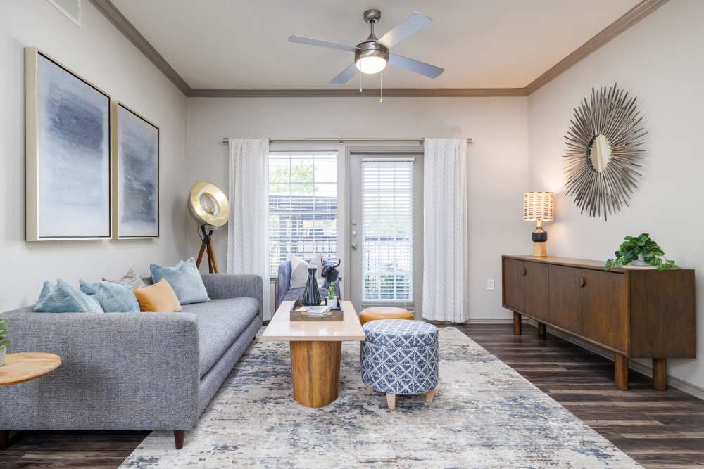 Living room in a home with tall ceilings at Trails at Canyon Creek in Austin, Texas