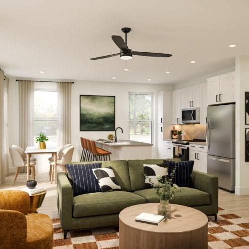 a living room with a green couch
