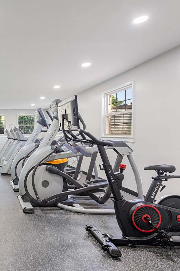 Spin Room with two bikes and tv Flats at Courthouse Square Apartments, Towson, MD, 21286