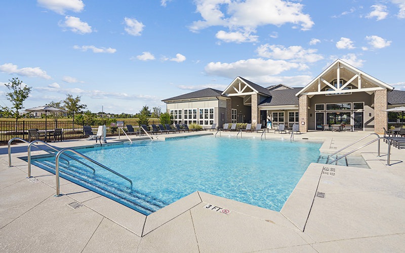 pool with a building behind