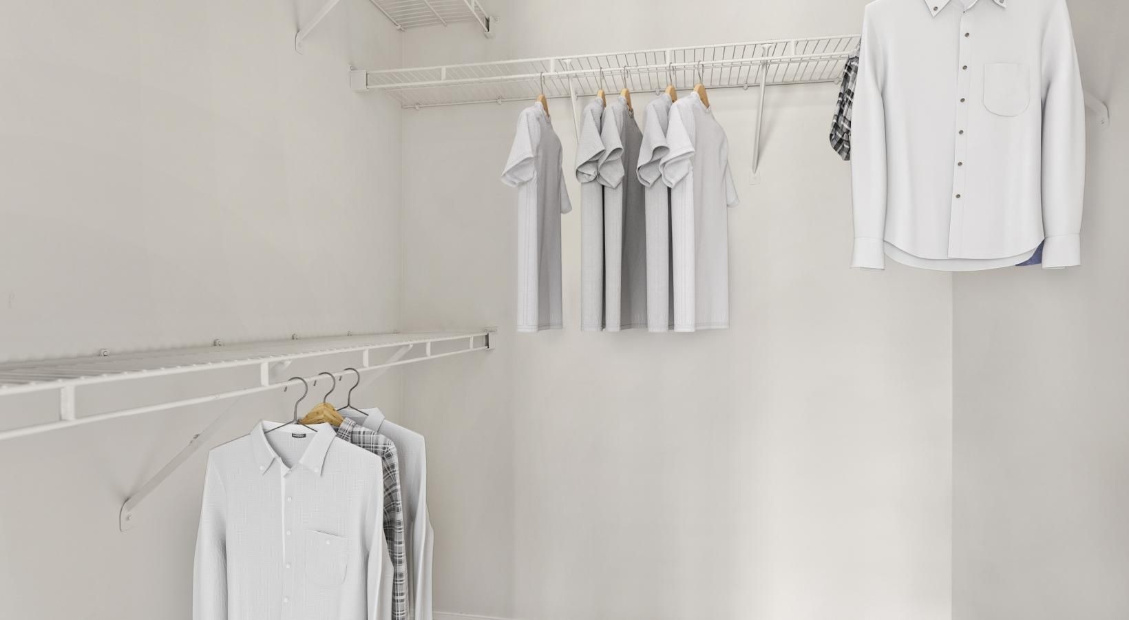 a group of white shirts on a white wall