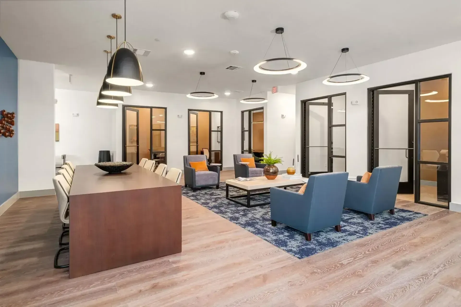 Co-Working Lounge with lounge chairs and table seating