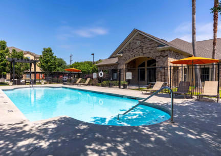 Sugar Mill Apartments in Addis, LA photo of a resort style swimming pool