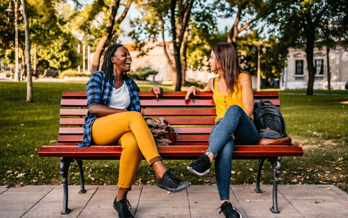 Residents having a chat on a park bench near Kensington Square in Rock Hill, South Carolina