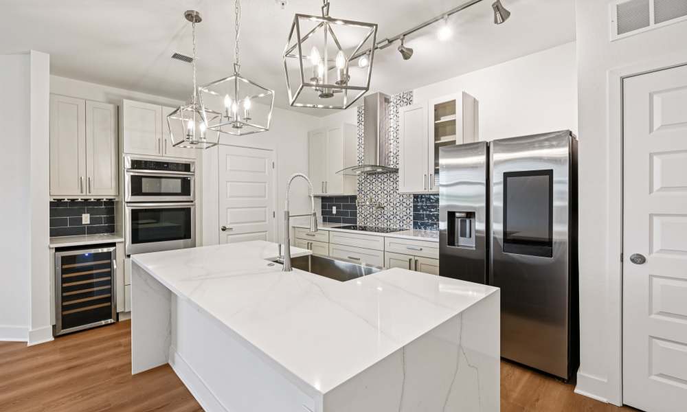 Gourmet Kitchen Island and Stainless-Steel Appliances at The Vivien in Vero Beach, Florida