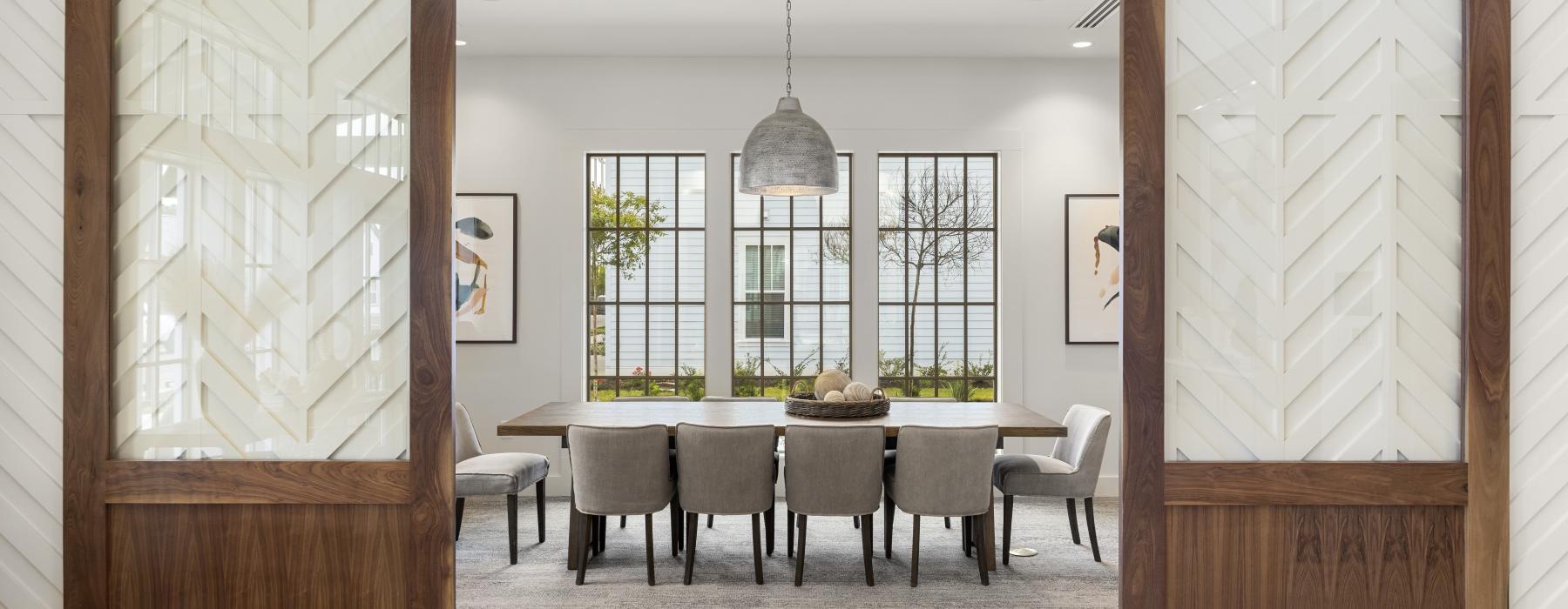 a conference room with a table and chairs