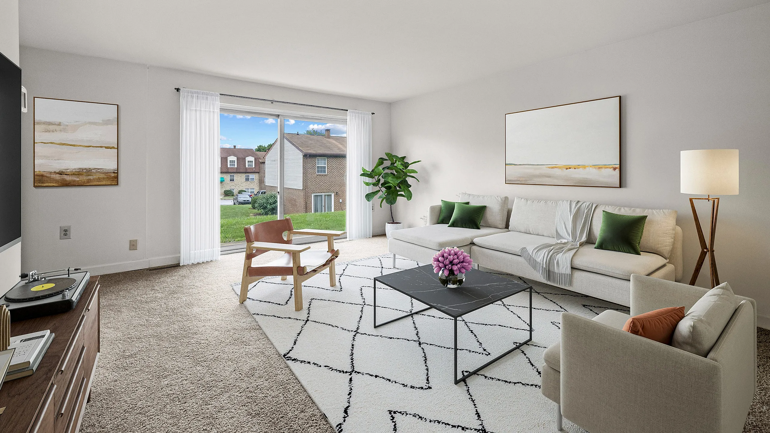 Inviting living room with cozy seating, large window view, and elegant decor in a modern apartment.