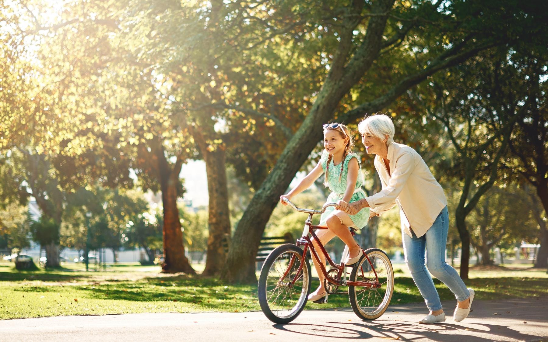 Grand daughter and grandma out riding bikes 