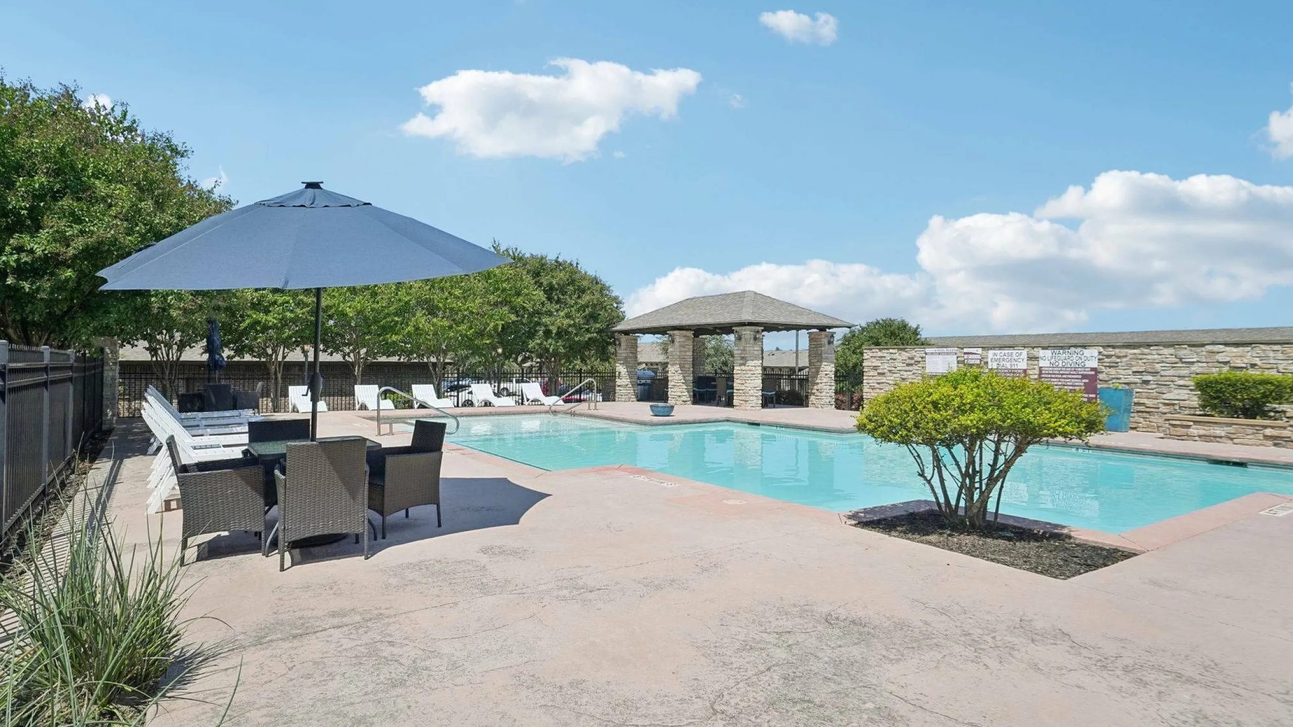 lounge seating by the sparkiling pool