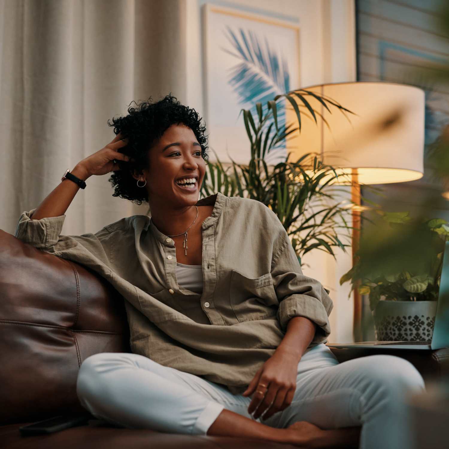 A resident in her apartment living room at The Ellery of Cary in Cary, North Carolina
