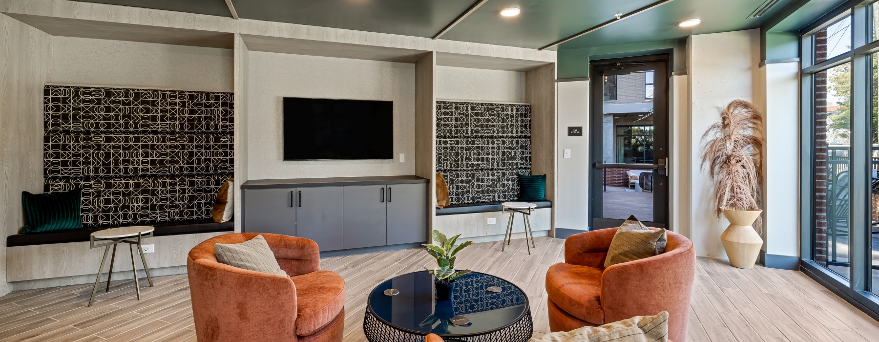 Spacious resident lounge area with wine wall 