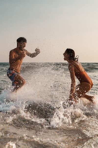 Residents playing in the ocean near Nine20 Manatee in Bradenton, Florida
