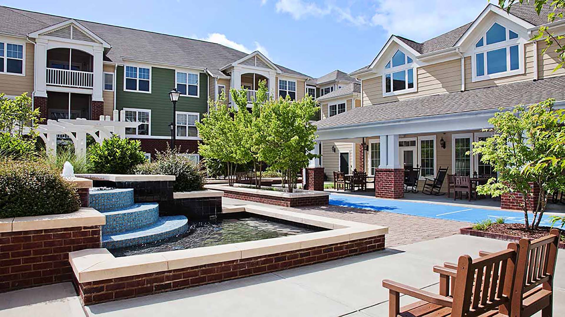 Courtyard water fountain and pond with seating