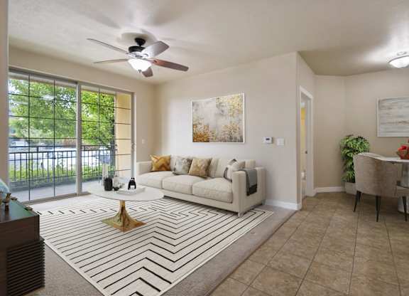 a living room with a couch and a coffee table at Siena Villas Apartments, Utah