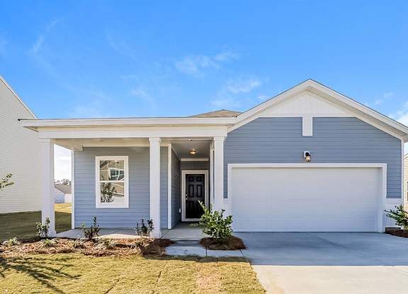 a blue house with a white garage door