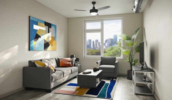 living room with modern decor and a large window