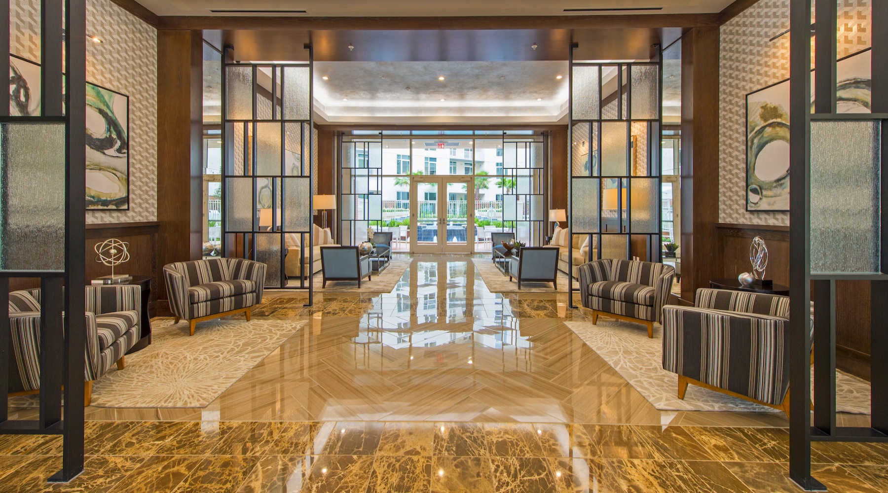 Large spacious lobby with tile floors and large windows 