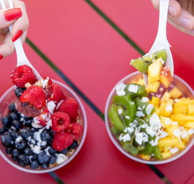 Two colorful acai bowls