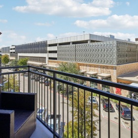 a building with a glass fence