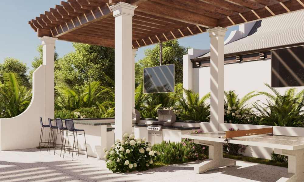 Outdoor grill area with pergola and seating at Brisa at St. Augustine in St. Augustine, Florida