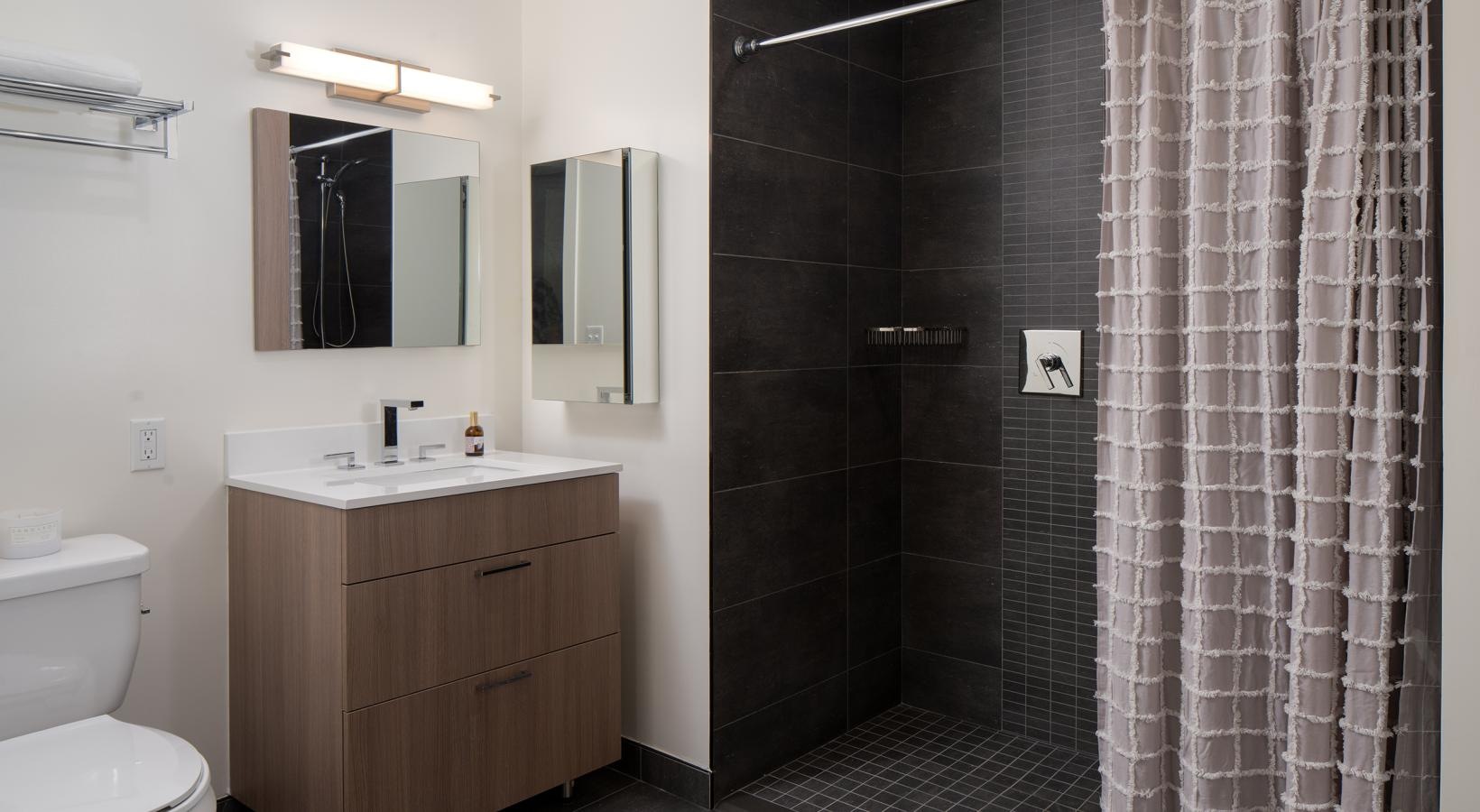 a bathroom with a shower curtain