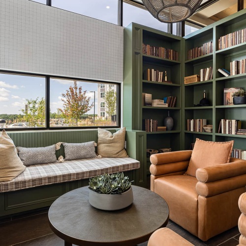 bookshelves filled with books in reading corner