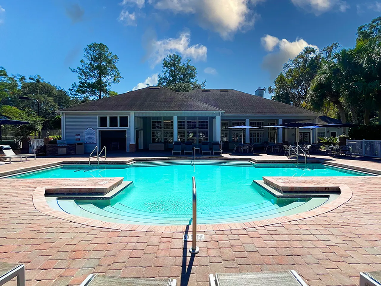 Swimming pool with lounge chairs and sundeck