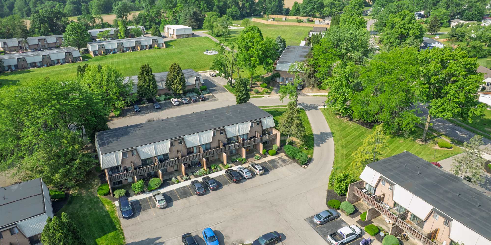 Residential buildings with green landscape in Heatherwood Terrace in Mansfield, Ohio