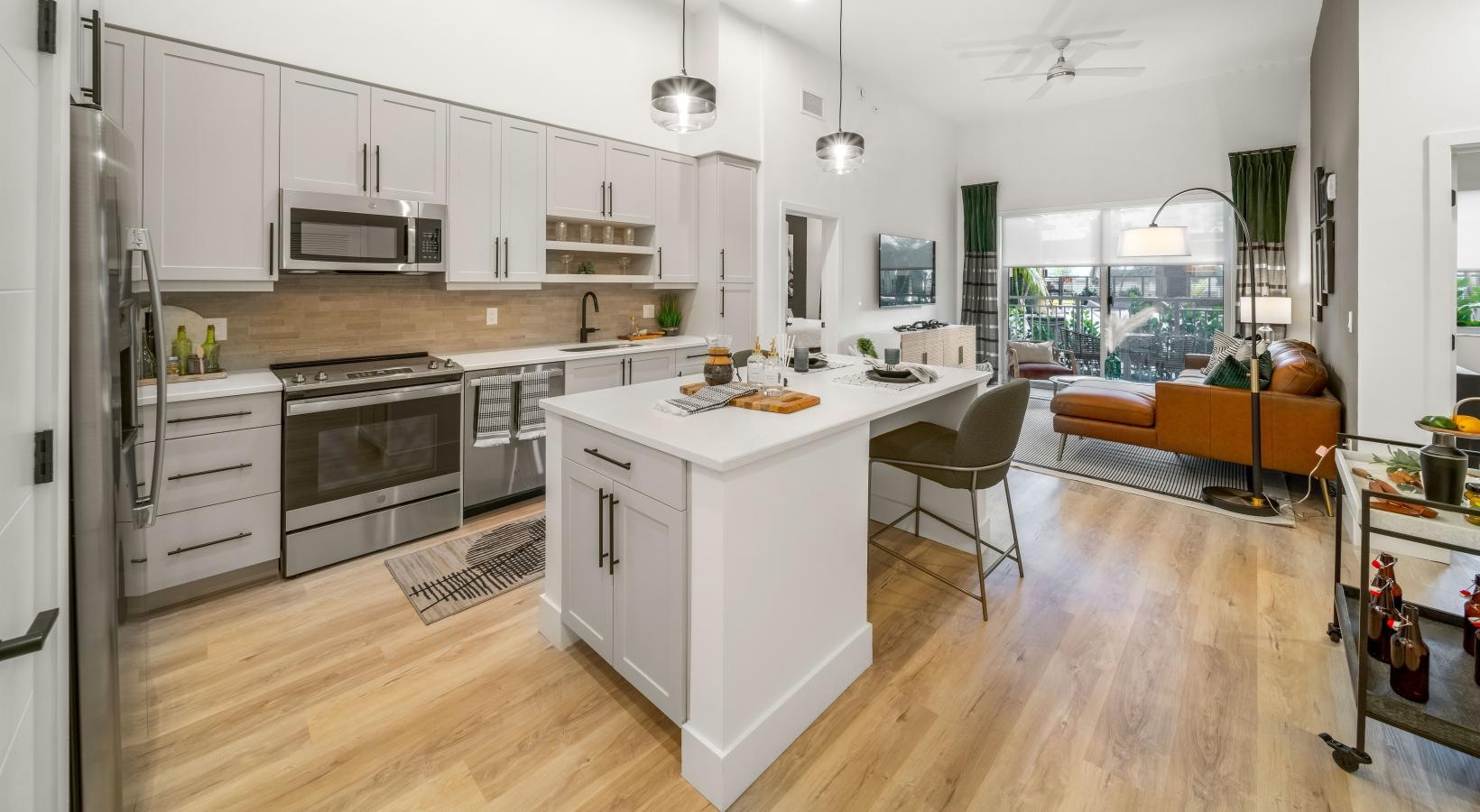 a kitchen with a wood floor