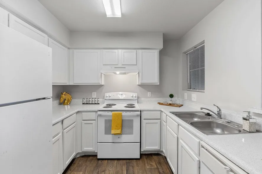 White appliances in unit kitchen at Fort Branch