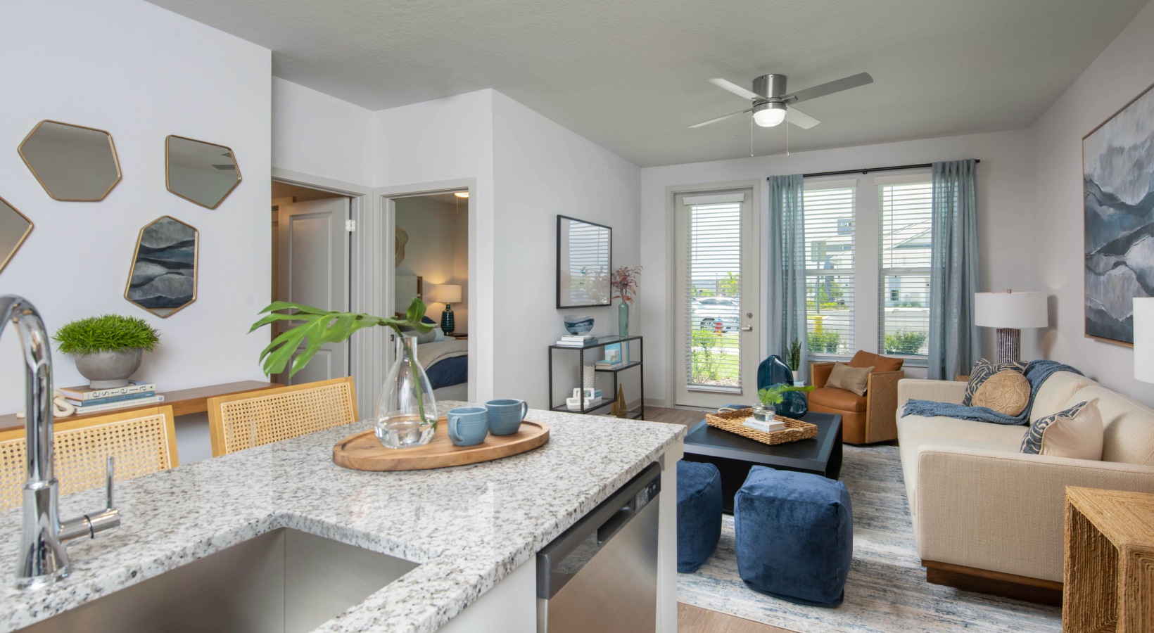 Bright open-concept living room at Madison Watergrass apartments in Wesley Chapel FL.