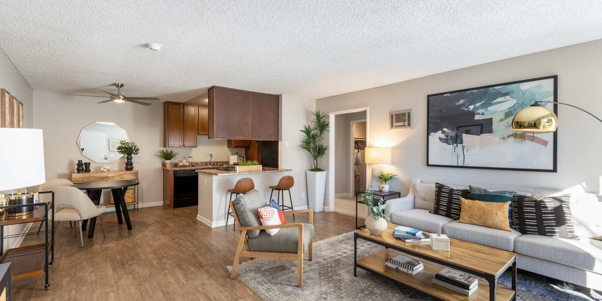 Living room, dining area and kitchen at Sofi Poway in Poway, California