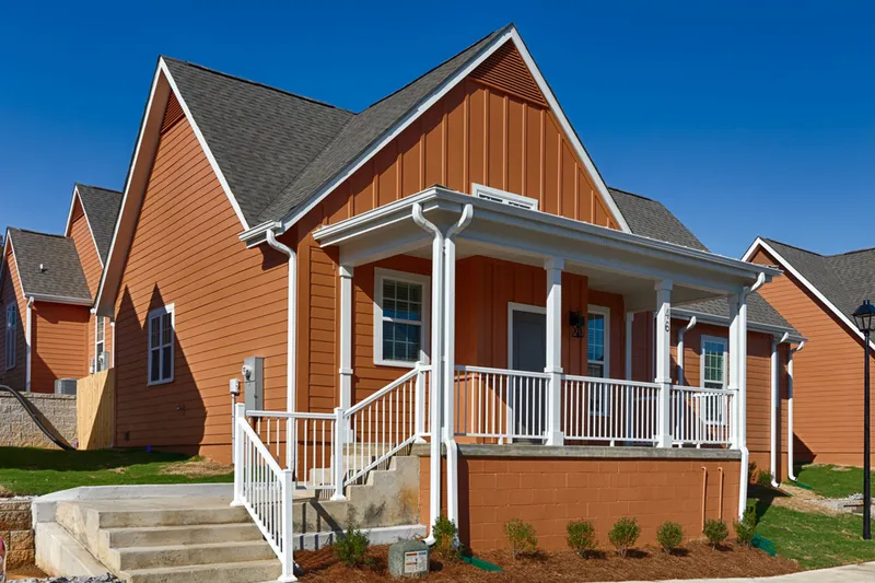 orange home exterior with patio