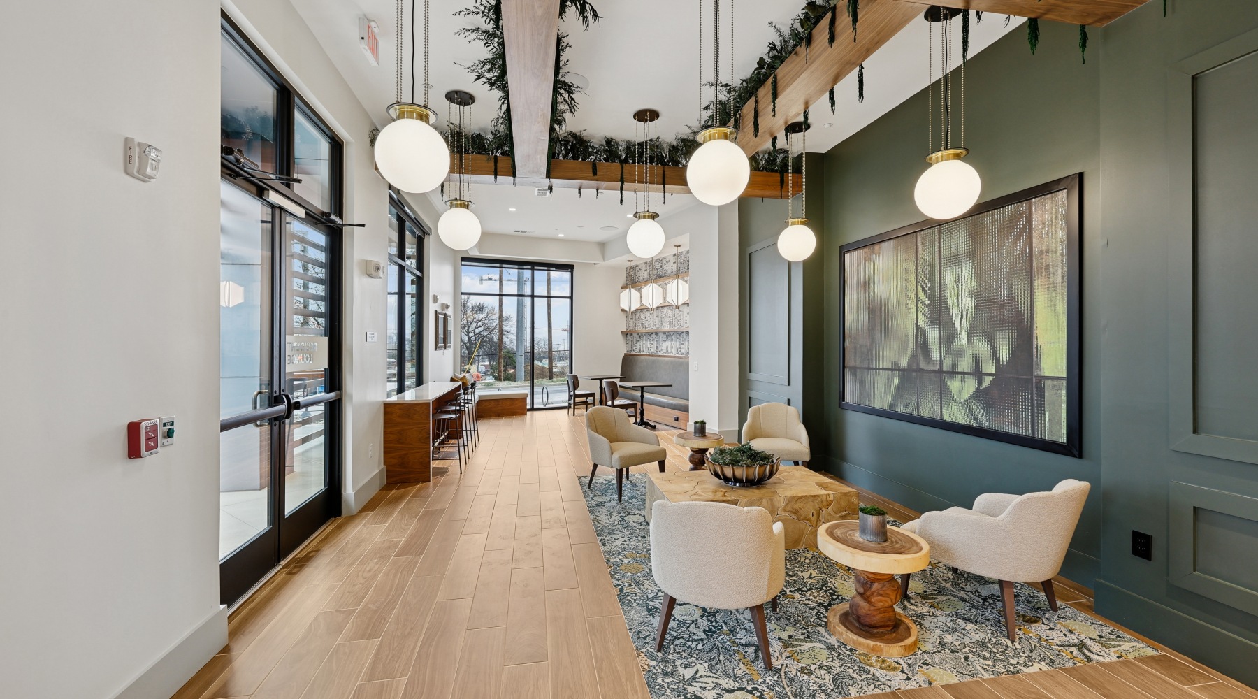 interior with green walls and plants on ceiling