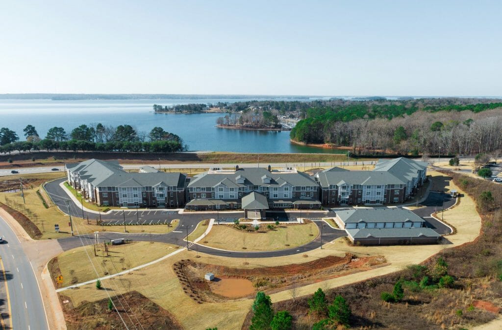 Lakeview Retirement Community, a premier 55 Plus Living community, offers scenic lakeside views. This aerial view showcases the community's beautiful grounds and modern architecture. Enjoy comfortable and active senior living.
