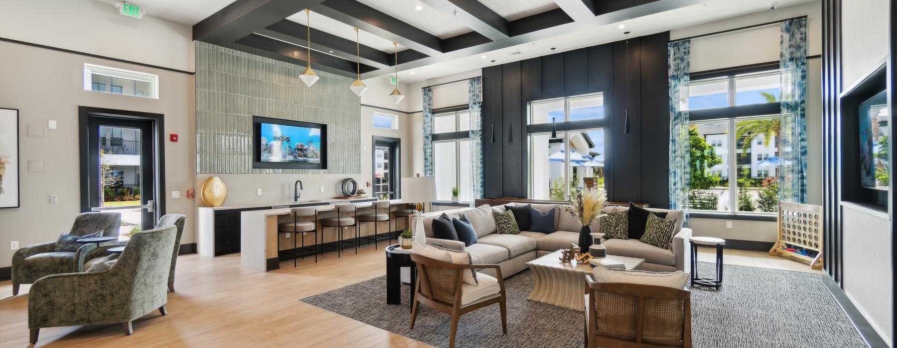 a large living room with a large glass wall