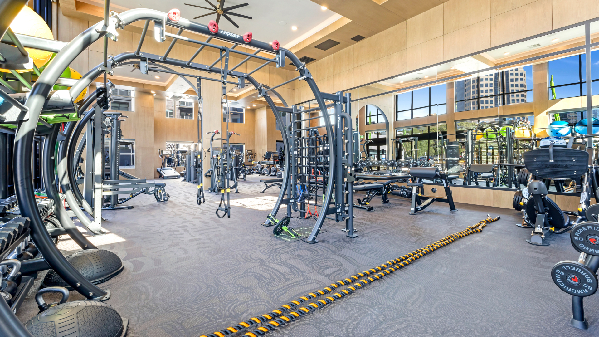 Luxury apartment gym with modern fitness equipment