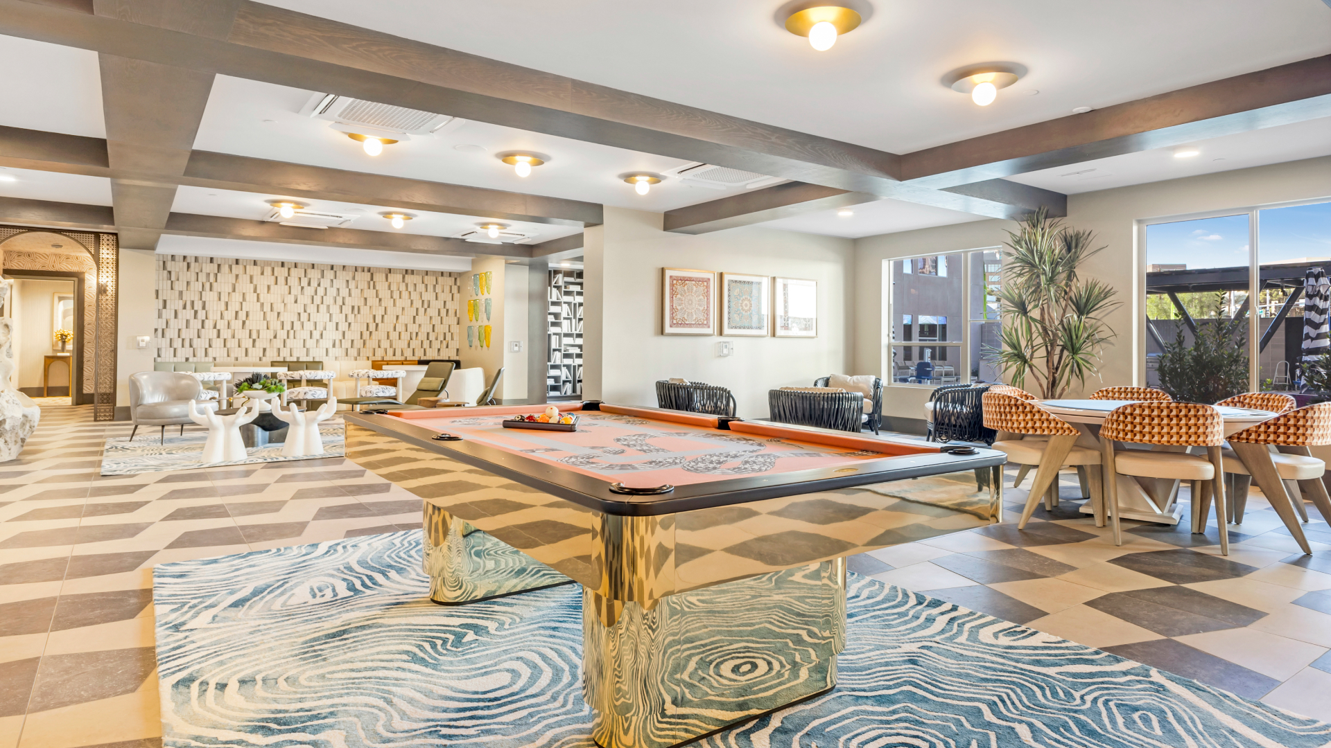 Luxury apartment clubhouse with modern seating and stylish decor Ainsley Living
