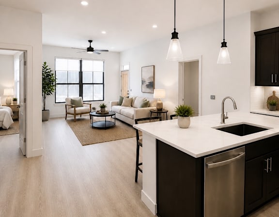 A rendering of a modern apartment complex with a landscaped courtyard.