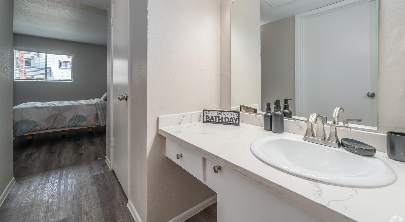 a bathroom with a large mirror