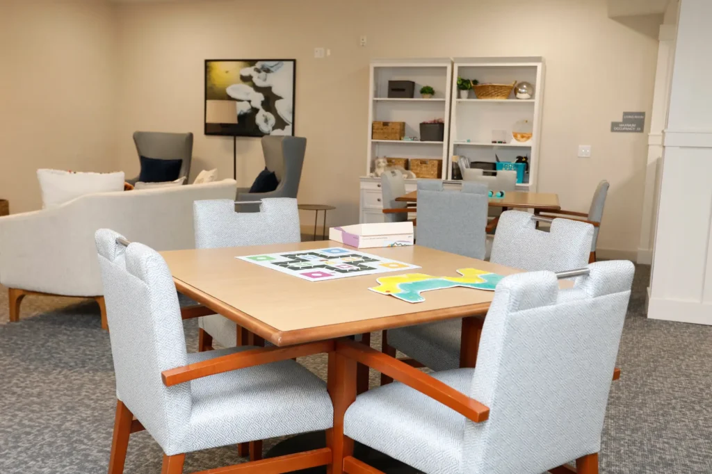 community area with games on tables for residents