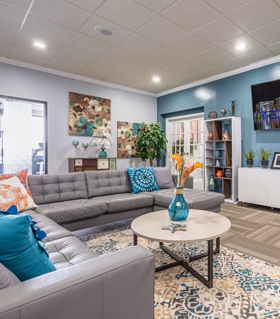a living room with couches and a coffee table