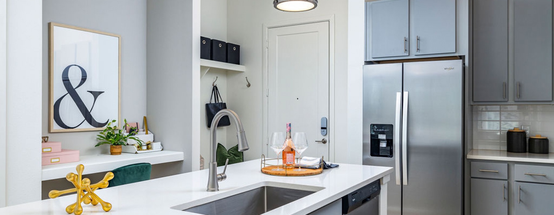 Modern kitchens with stainless steel appliances at Legacy Universal