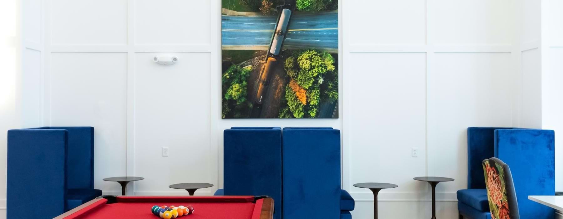 a room with a table and chairs