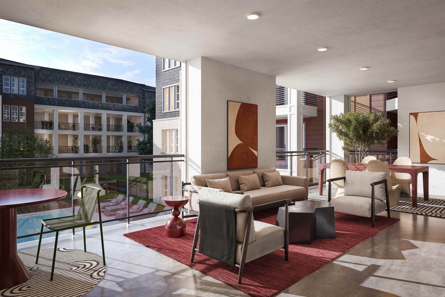 The elevated clubhouse terrace at Otto on the Trail overlooking the resort-style pool and native East Austin landscaping.