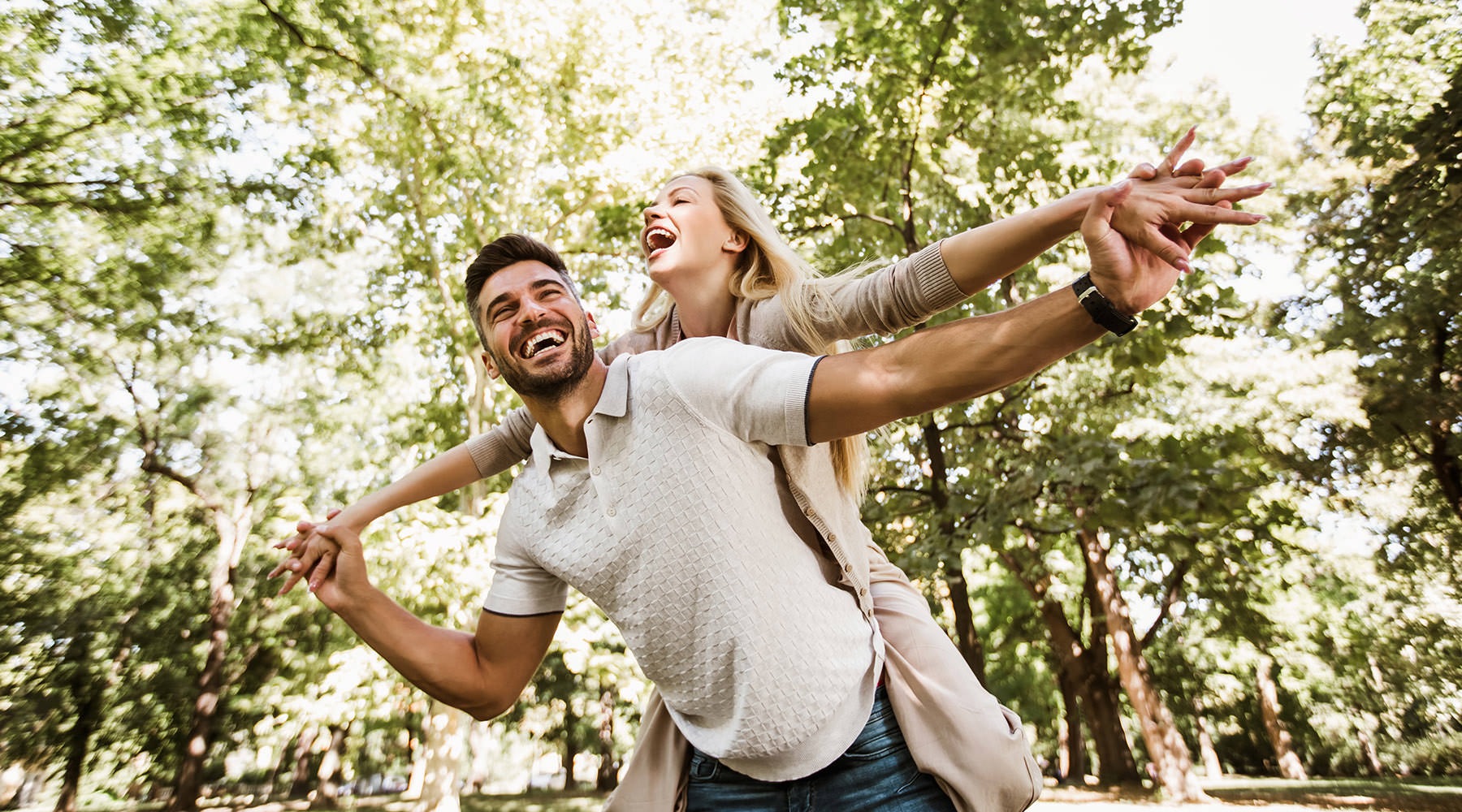 a couple laughing and dancing