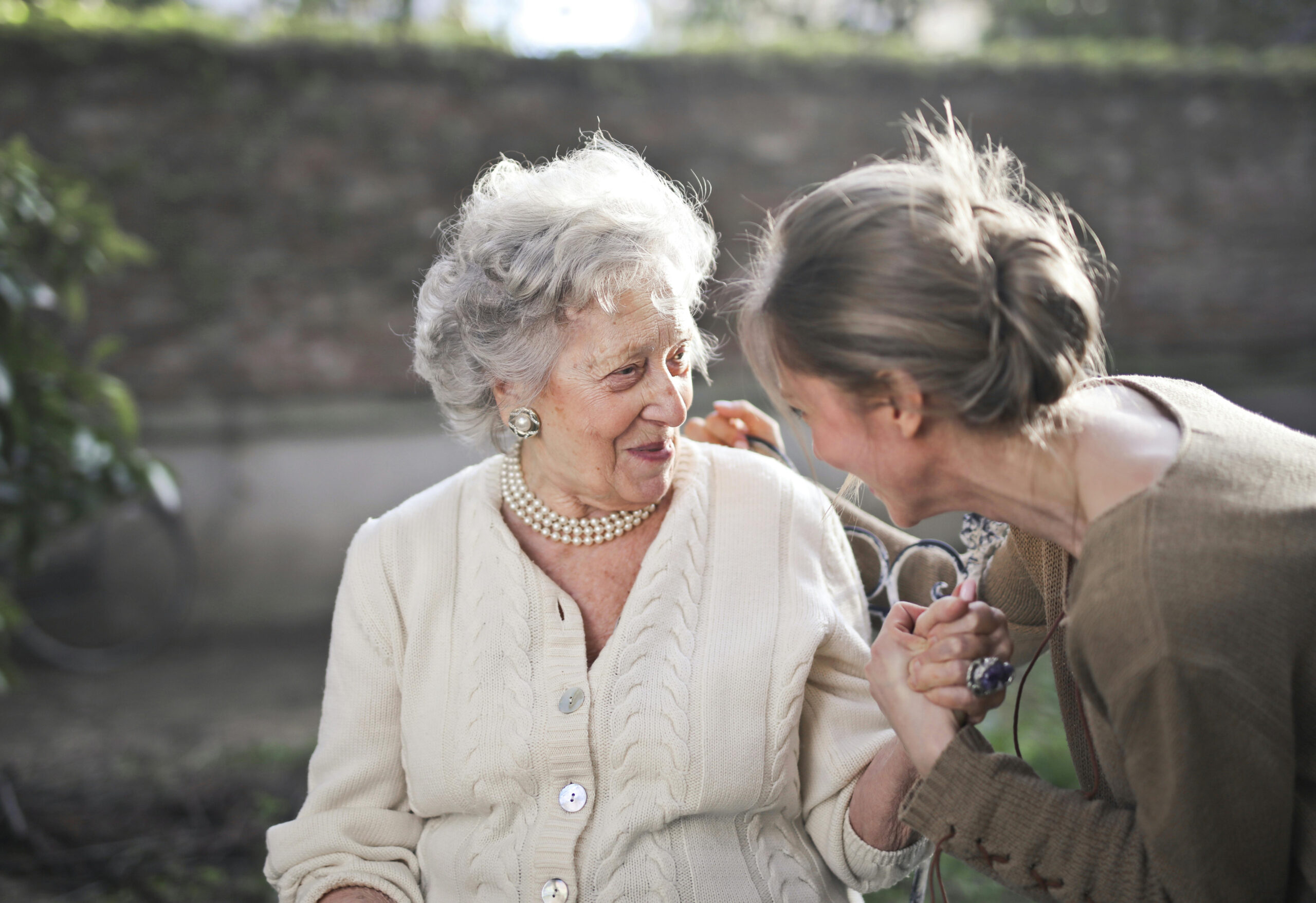 Assisted living resident with caregiver at All Seasons Ann Arbor
