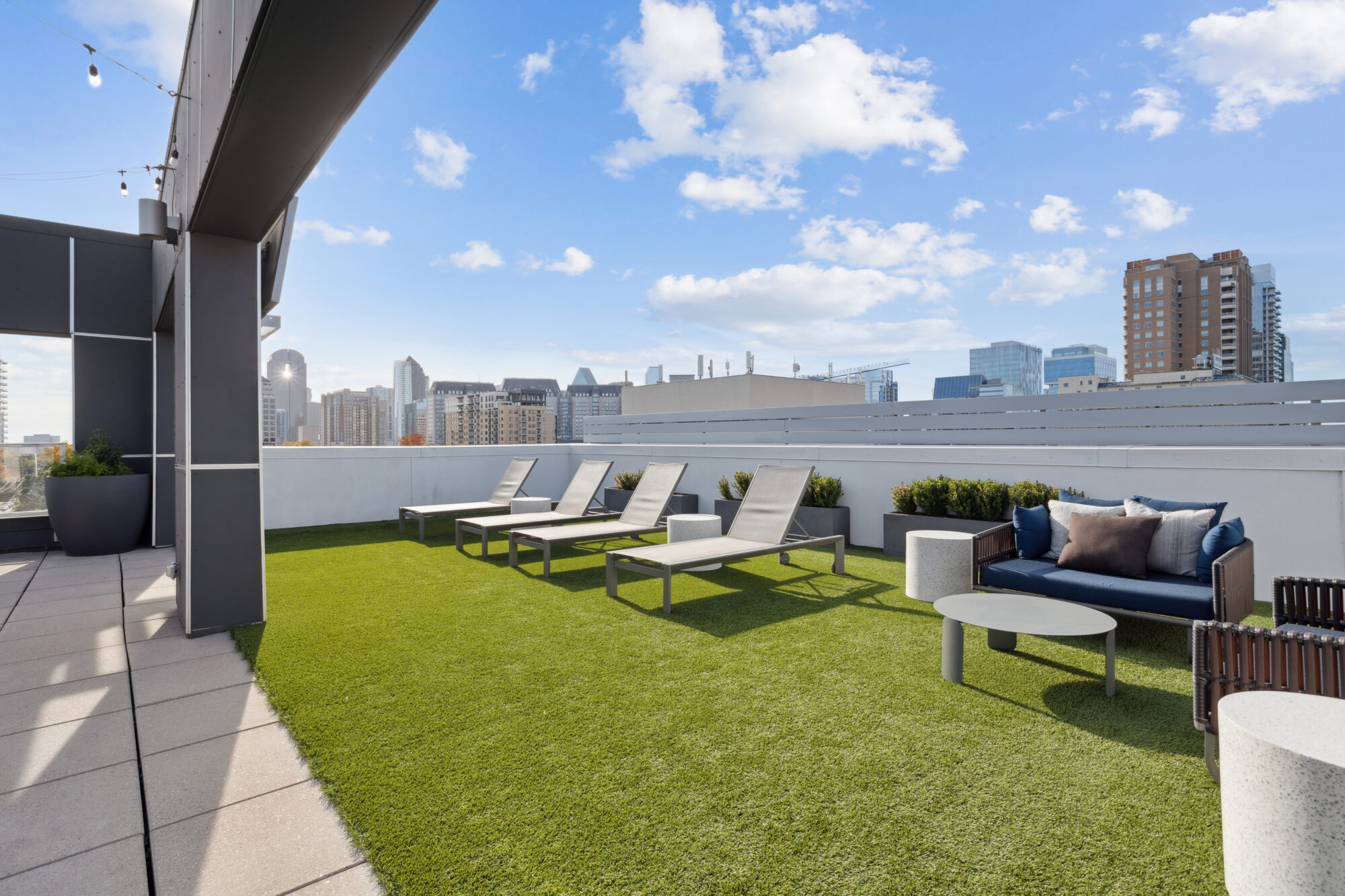 Rooftop deck with lounge seating an TV